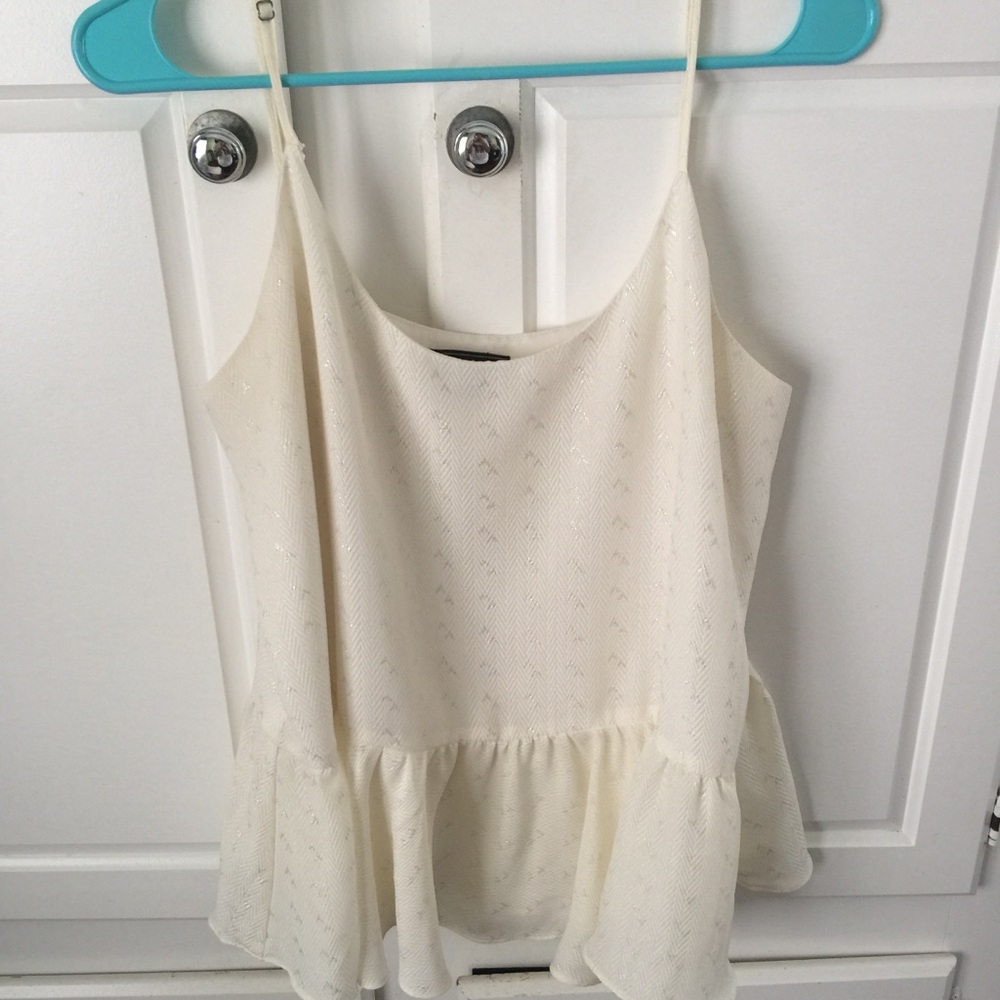 Cream ruffled top